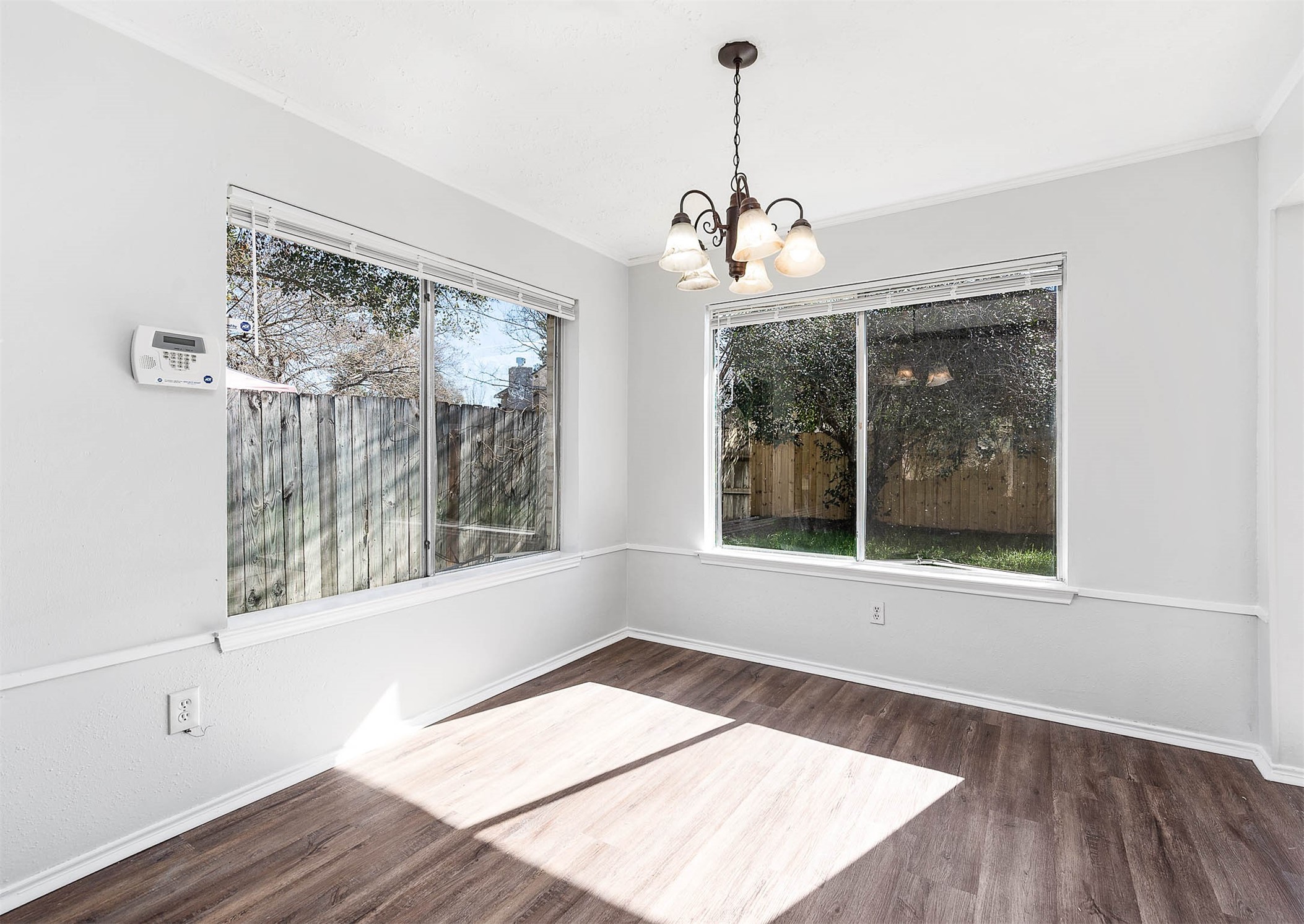 3423 Nutwood Lane Spring, TX 77389 - Photo 8 of 20 a view of a room with a large window wooden floor and front door