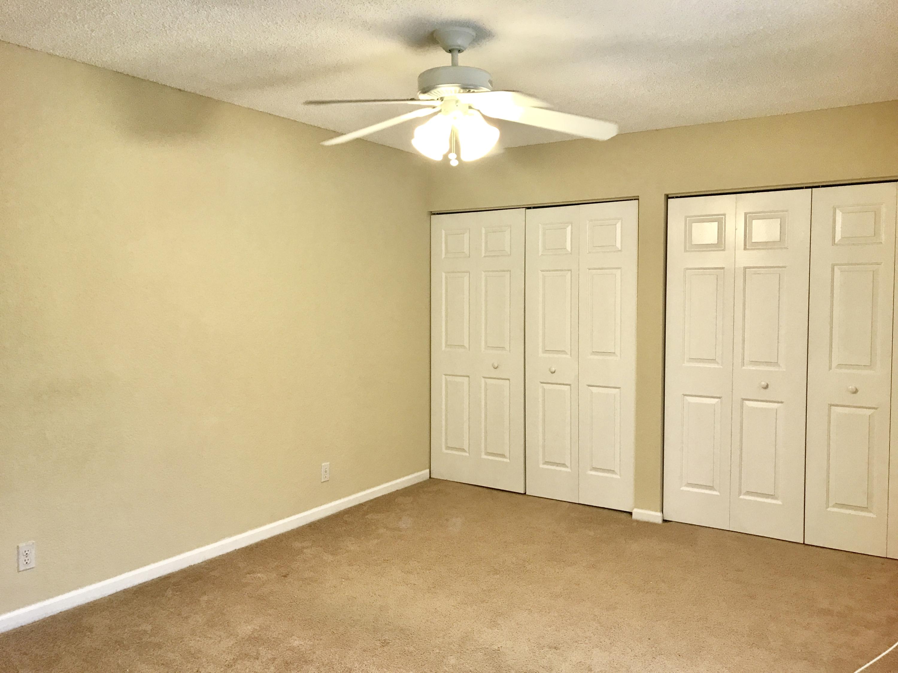 8218 Severn Drive, Unit D Boca Raton, FL 33433 - Photo 4 of 17 master bedroom