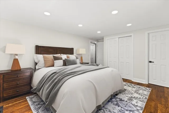 a bed room with a bed and a lamp