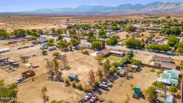 an aerial view of residential building and green space