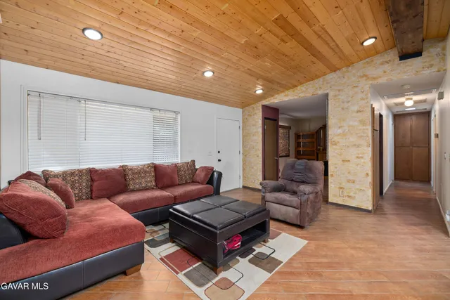 a living room with furniture and a couch