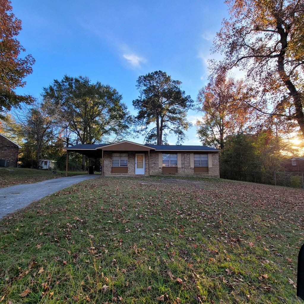 6640 Playfield Drive Columbus, GA 31907 - Photo 2 of 11 a backyard of a house with lots of green space