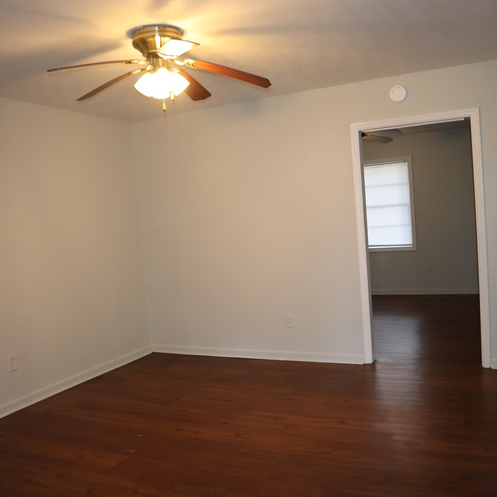 6640 Playfield Drive Columbus, GA 31907 - Photo 4 of 11 a view of empty room with wooden floor