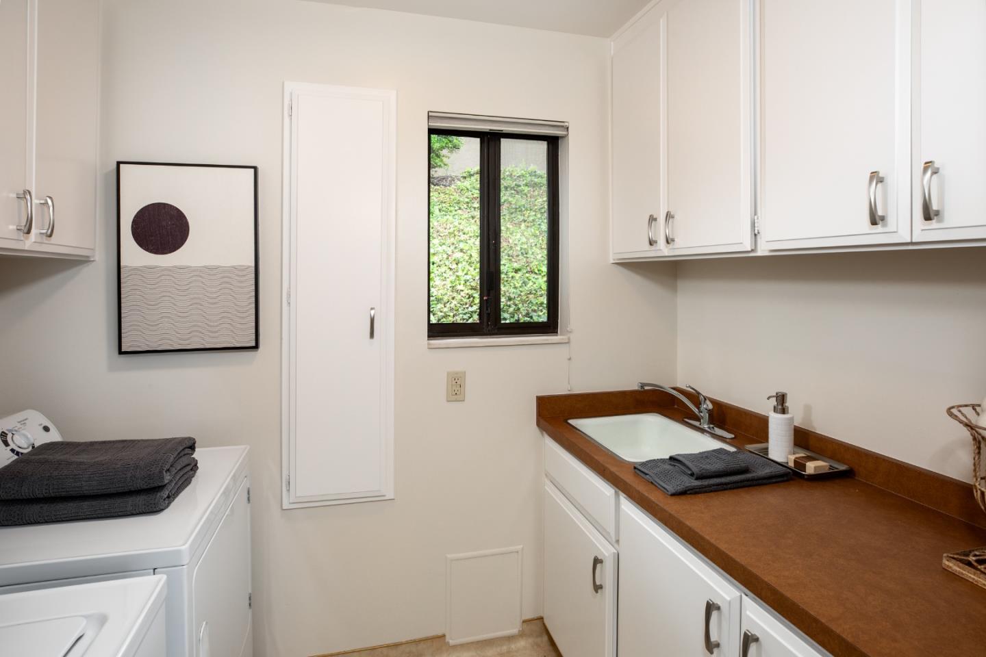 22415 Rancho Deep Cliff Drive Cupertino, CA 95014 - Photo 19 of 33 a room with storage and utility