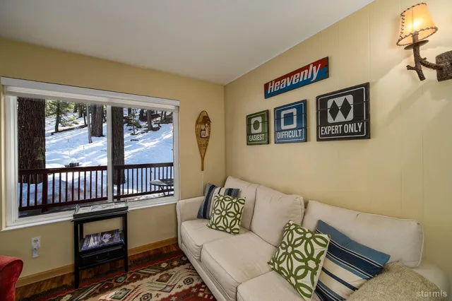 a kitchen with a refrigerator a stove top oven a sink and dishwasher