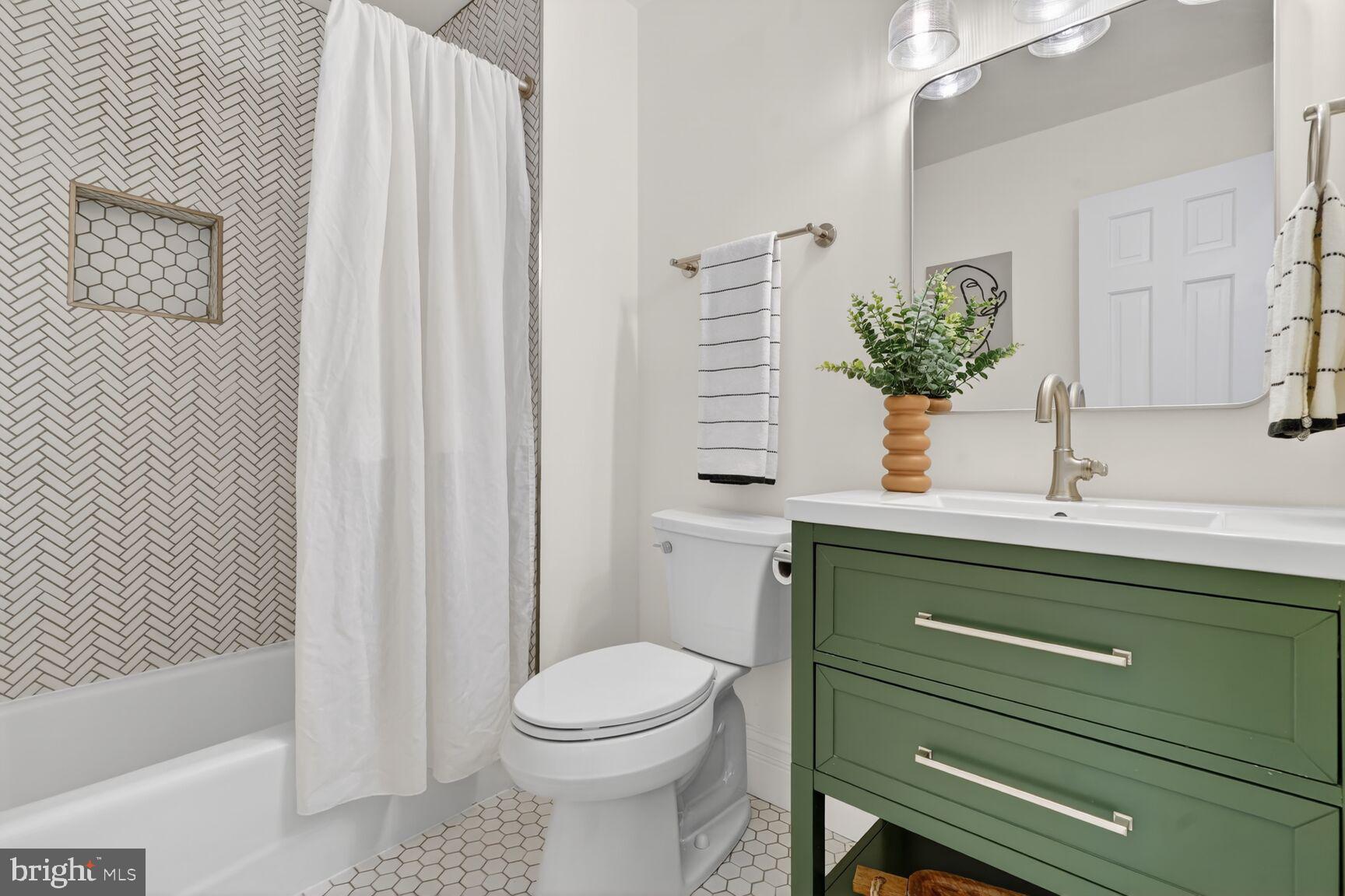 3426 16th Street Northwest, Unit 604 Washington, DC 20010 - Photo 35 of 65 Tastefully Renovated Bath with Beautiful Tile