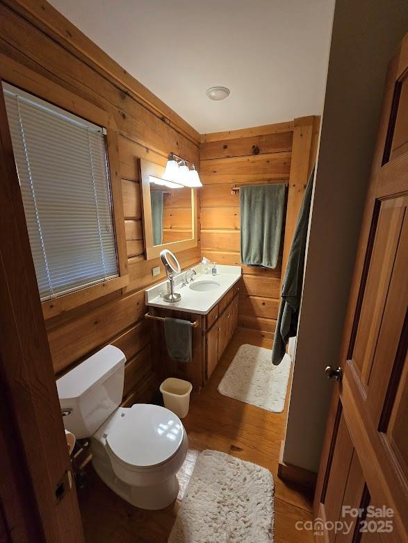 979 Wagon Road, Unit 68 Warrensville, NC 28693 - Photo 16 of 40 a bathroom with a sink and toilet