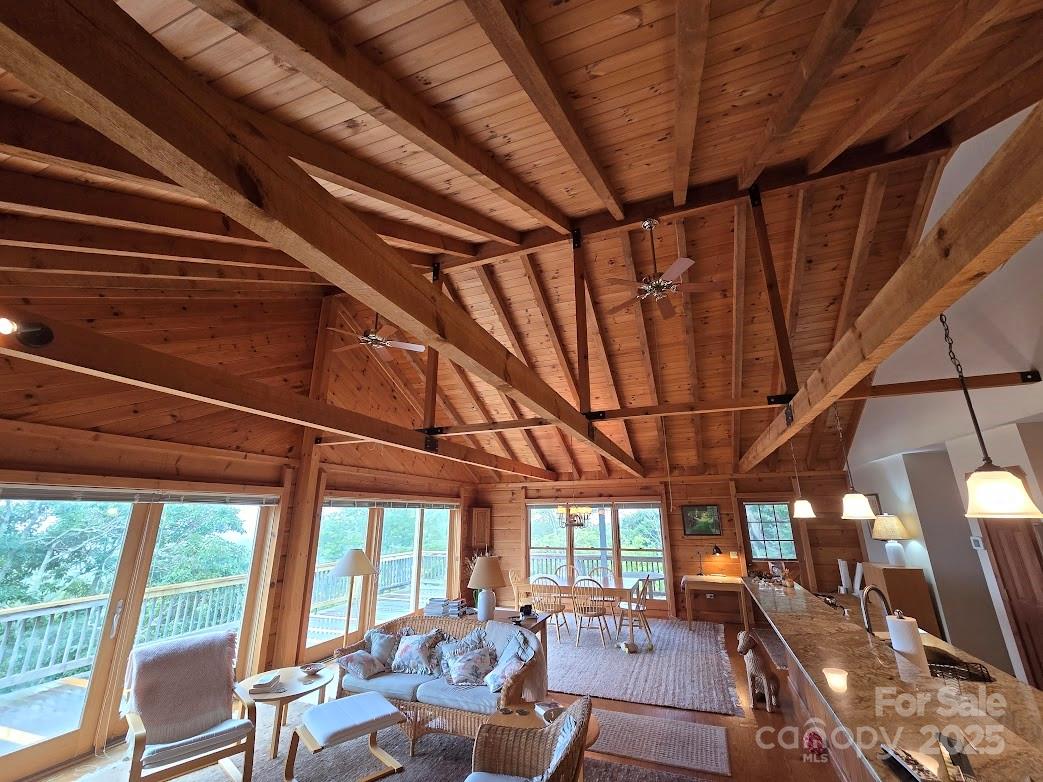 979 Wagon Road, Unit 68 Warrensville, NC 28693 - Photo 32 of 40 a view of a room with furniture and wooden floor