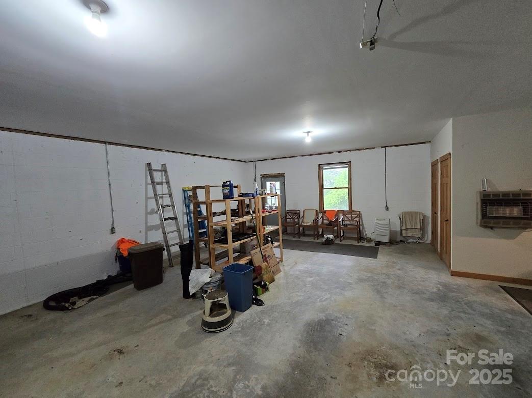 979 Wagon Road, Unit 68 Warrensville, NC 28693 - Photo 35 of 40 a view of a livingroom with furniture and a window