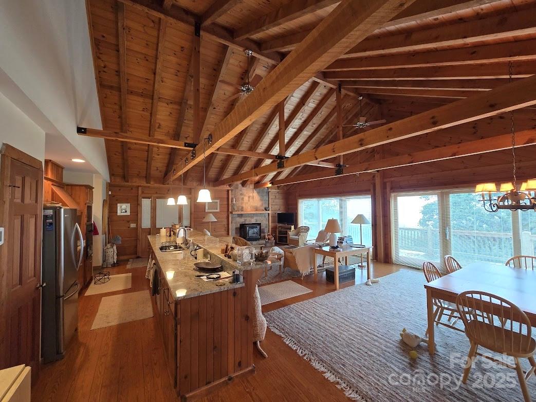 979 Wagon Road, Unit 68 Warrensville, NC 28693 - Photo 9 of 40 a view of a studio with wooden floor
