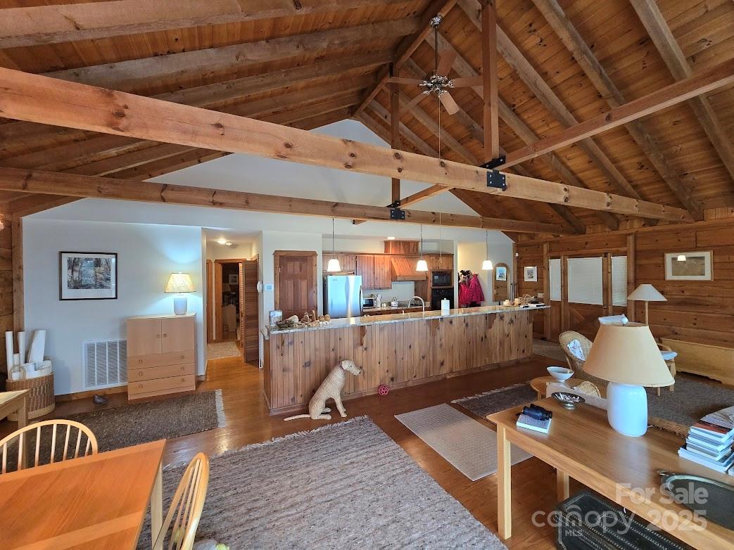 979 Wagon Road, Unit 68 Warrensville, NC 28693 - Photo 10 of 40 a outdoor living space with furniture