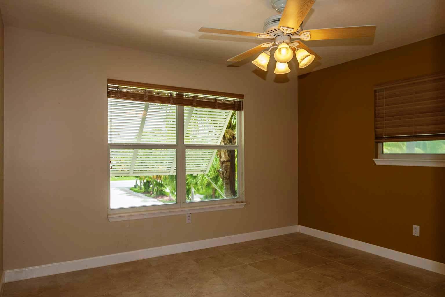 493 Sombrero Beach Road Marathon, FL 33050 - Photo 10 of 12 LARGE GUEST BEDROOM