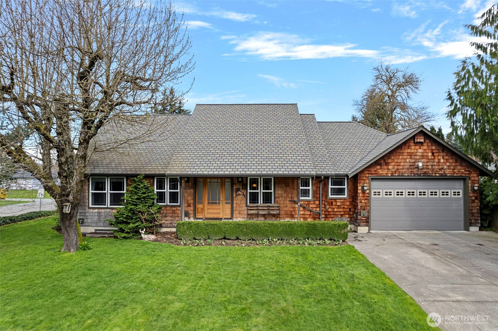 front view of a house with a yard