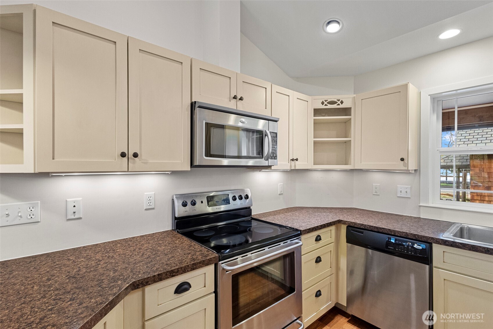 1925 Township Street Sedro-Woolley, WA 98284 - Photo 11 of 40 a kitchen with granite countertop white cabinets and stainless steel appliances