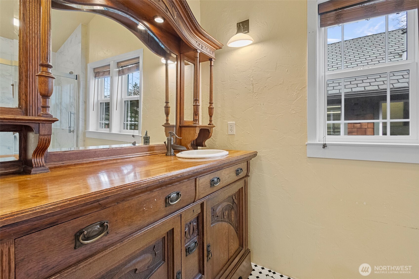 1925 Township Street Sedro-Woolley, WA 98284 - Photo 17 of 40 a view of a bathroom with a sink and a mirror