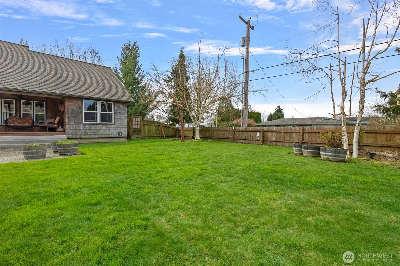 1925 Township Street Sedro-Woolley, WA 98284 - Photo 35 of 40 a view of a house with a big yard and potted plants