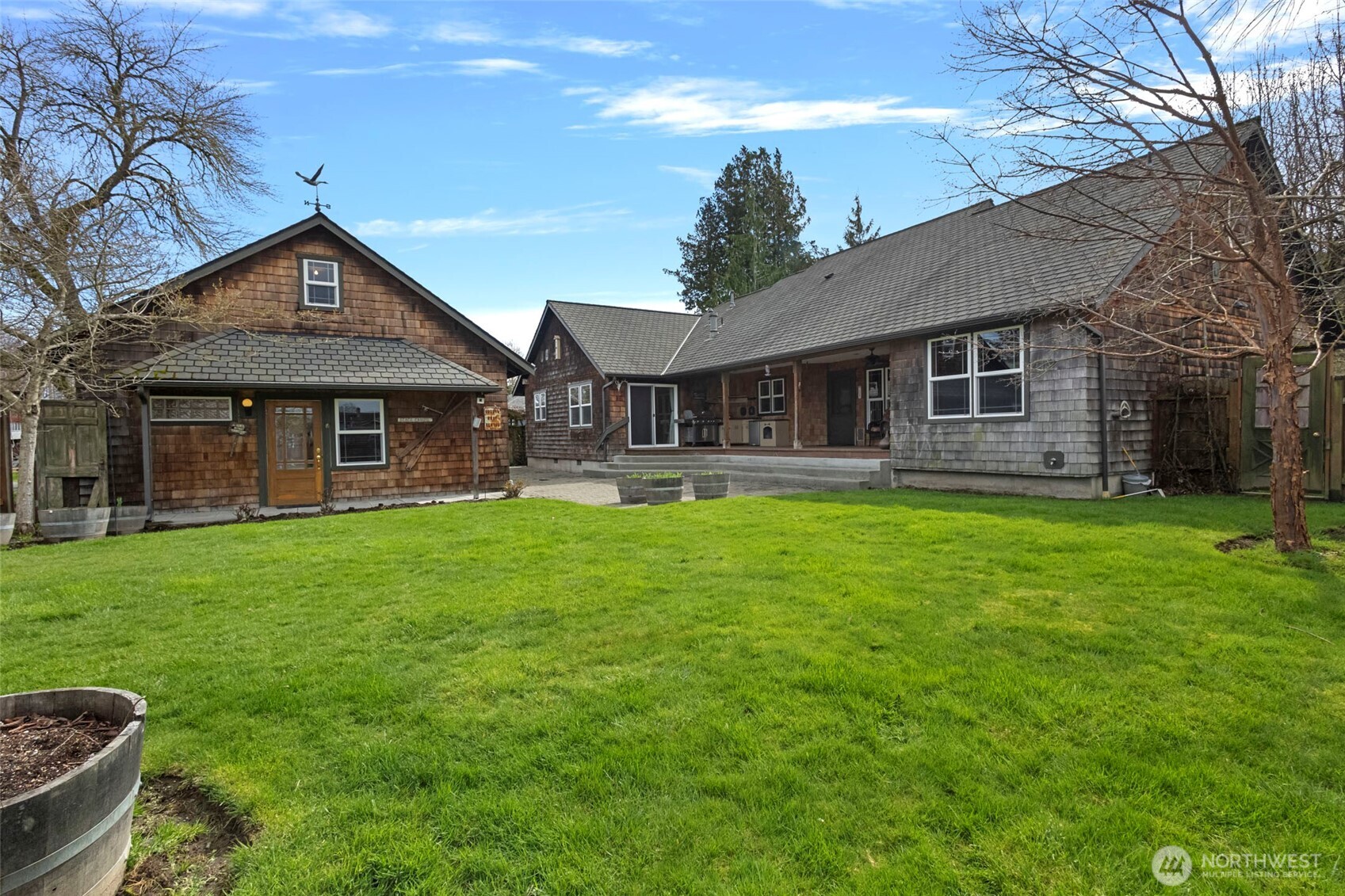 1925 Township Street Sedro-Woolley, WA 98284 - Photo 36 of 40 a front view of a house with a yard table and chairs