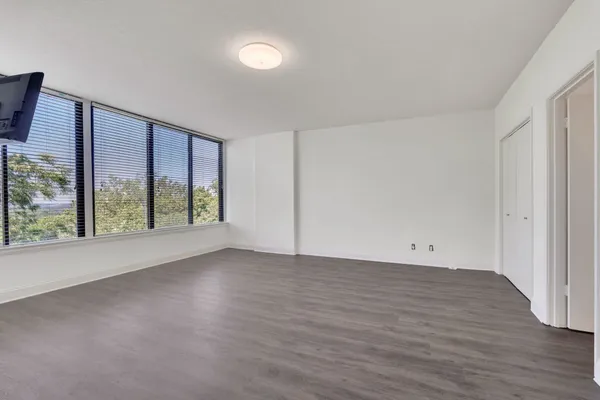 a view of a room with a large window