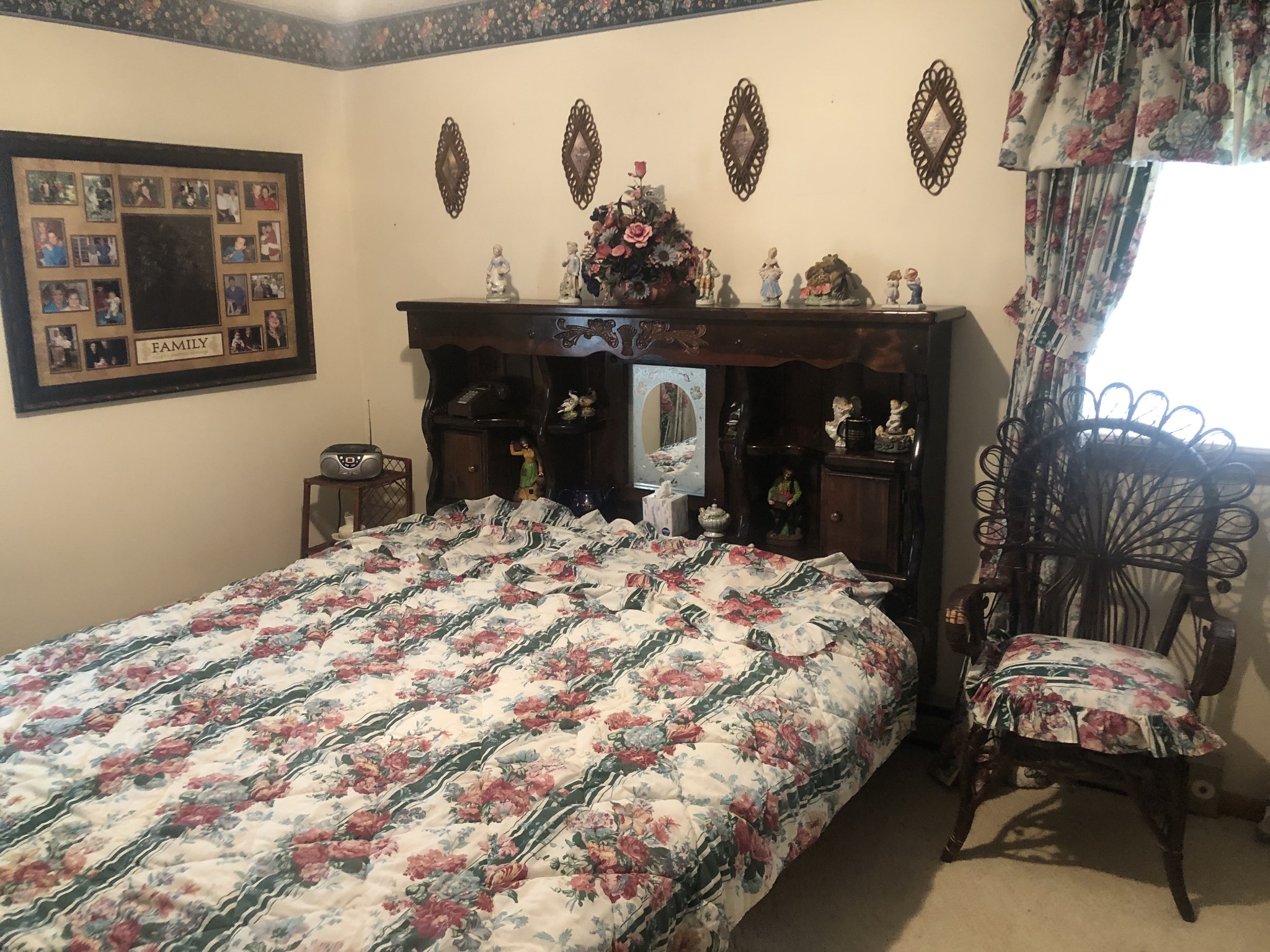 5279 Oak Grove Road Red Boiling Springs, TN 37150 - Photo 14 of 23 a bed sitting in a bedroom and painting on the wall