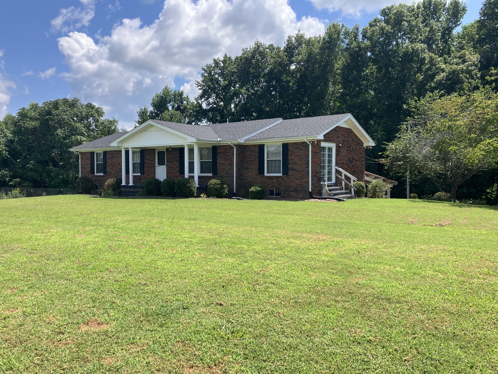 5279 Oak Grove Road Red Boiling Springs, TN 37150 - Photo 2 of 23 a view of a house with a yard