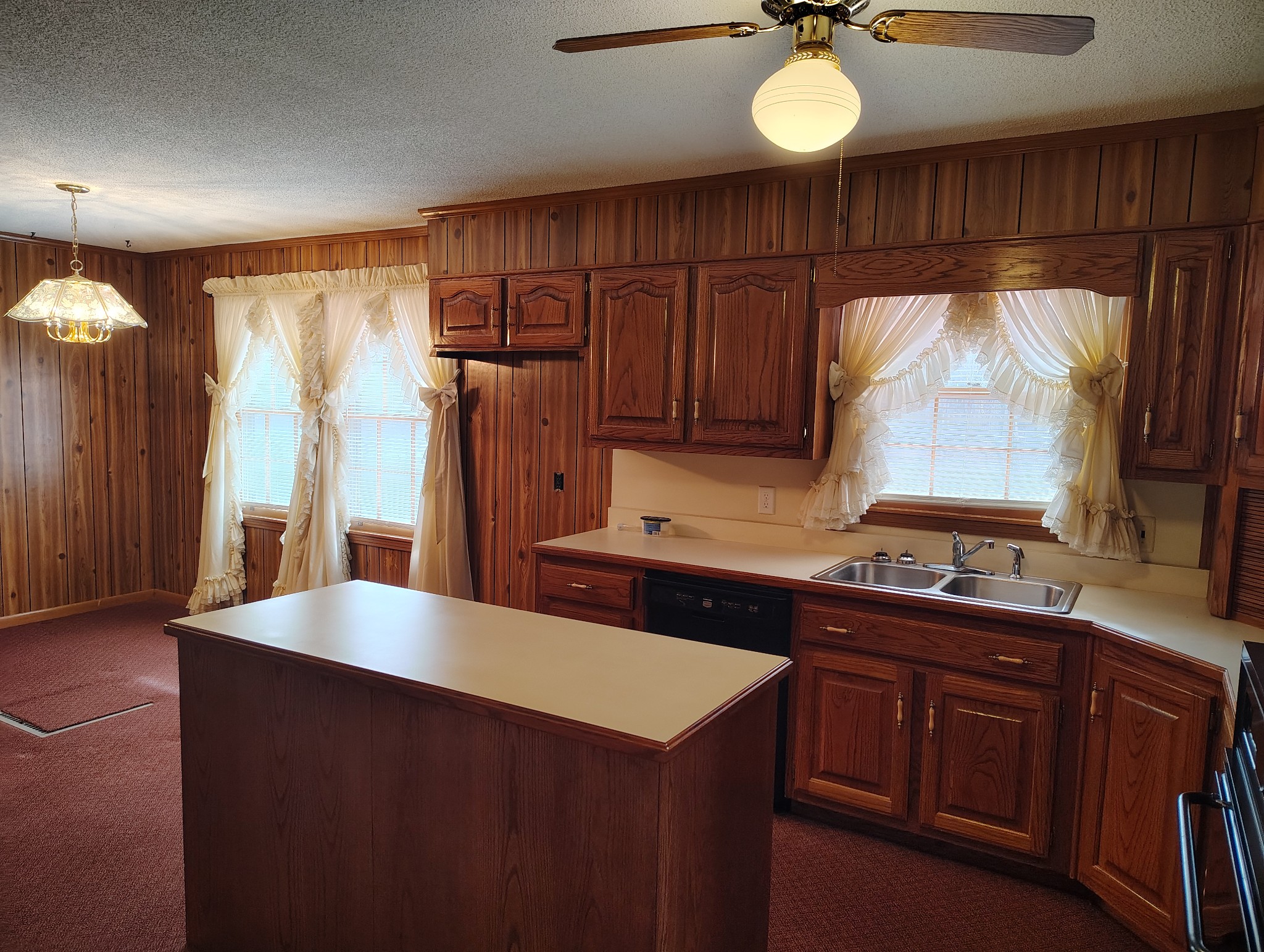5279 Oak Grove Road Red Boiling Springs, TN 37150 - Photo 8 of 23 a kitchen with stainless steel appliances a sink stove and cabinets