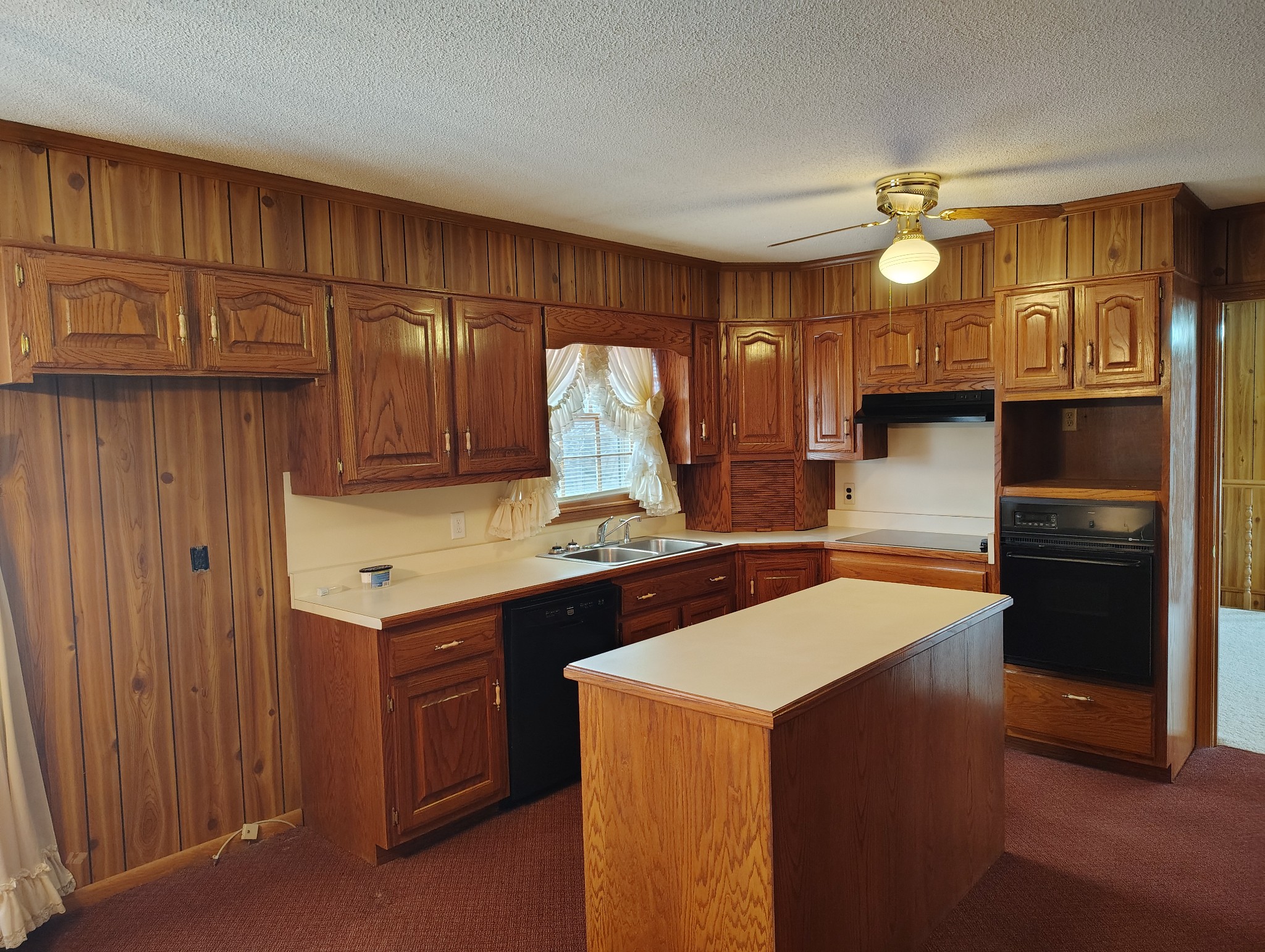 5279 Oak Grove Road Red Boiling Springs, TN 37150 - Photo 9 of 23 a kitchen with a stove and a refrigerator