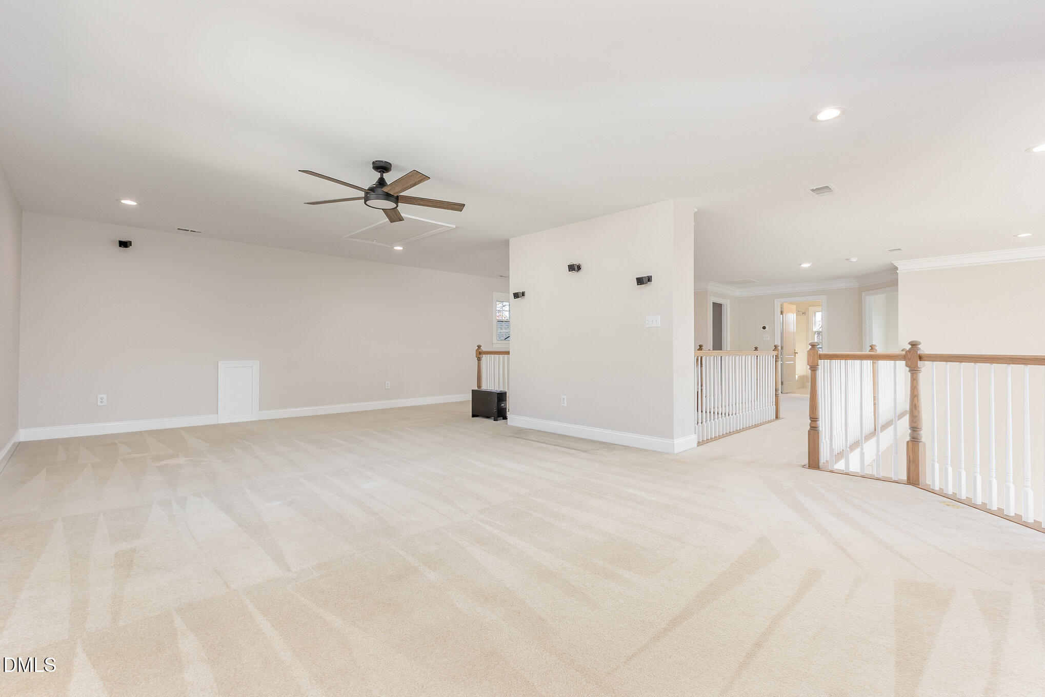 9113 Mission Hills Court Raleigh, NC 27617 - Photo 21 of 36 a view of a livingroom with a ceiling fan