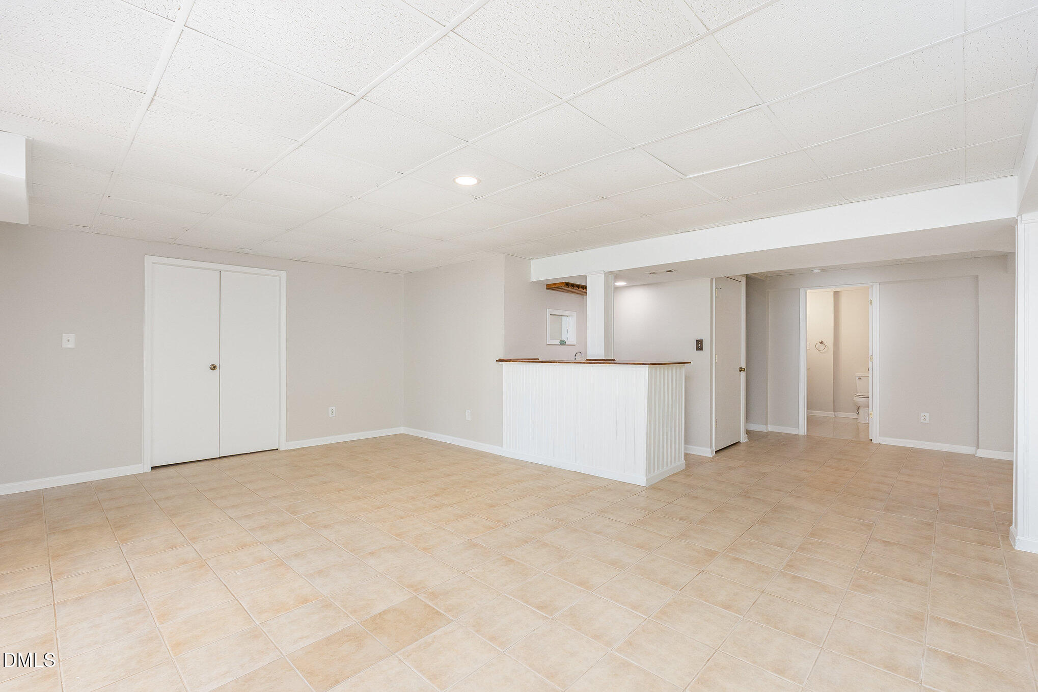 9113 Mission Hills Court Raleigh, NC 27617 - Photo 30 of 36 a view of an empty room with a kitchen