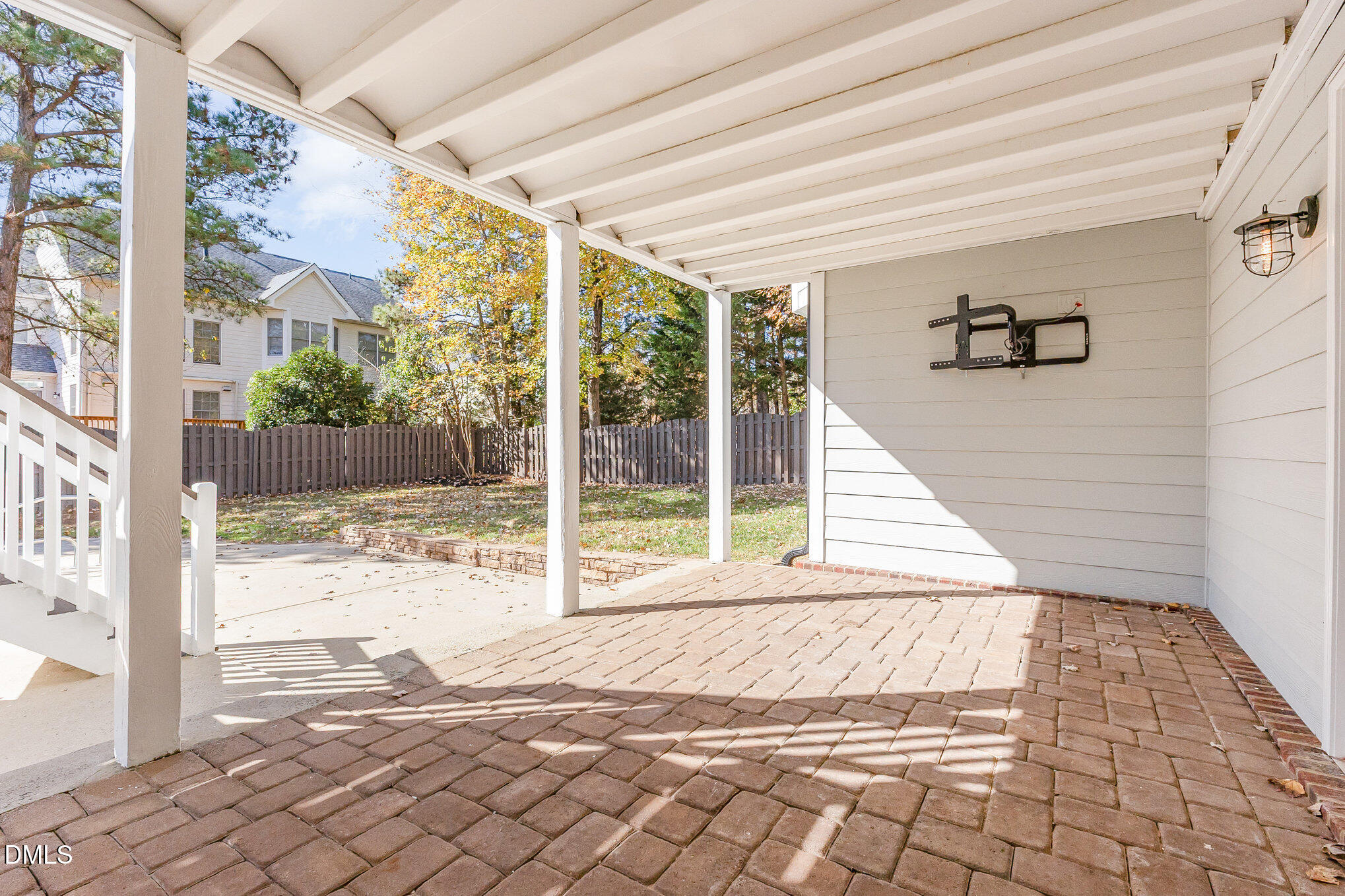 9113 Mission Hills Court Raleigh, NC 27617 - Photo 32 of 36 a view of a porch with a floor to ceiling window