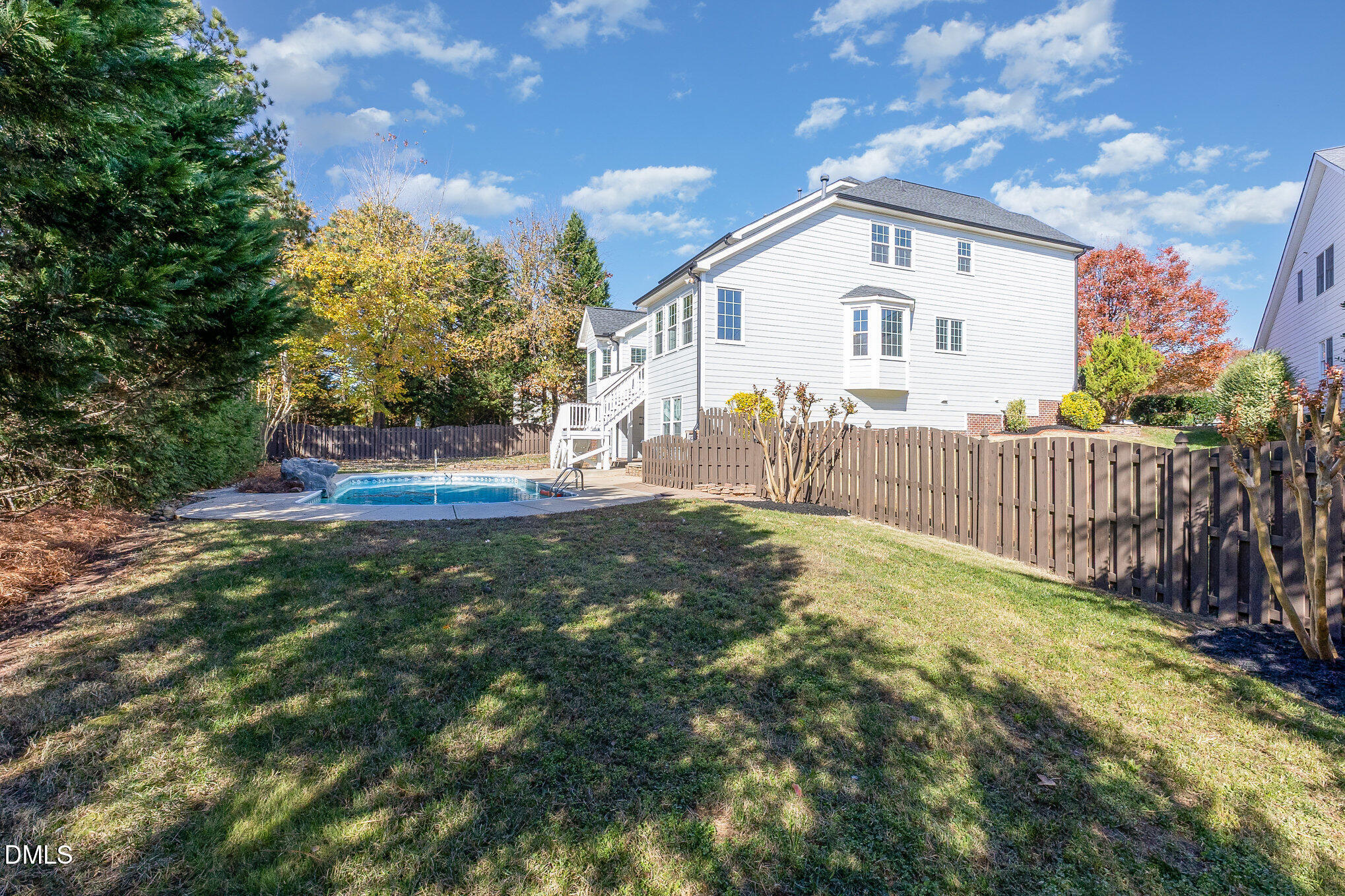 9113 Mission Hills Court Raleigh, NC 27617 - Photo 33 of 36 a view of an house with backyard and garden