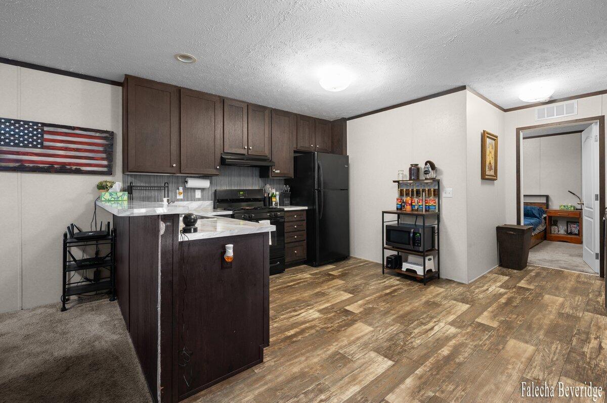 1281 East Pontaluna Road, Unit 101 Spring Lake, MI 49456 - Photo 6 of 18 Kitchen