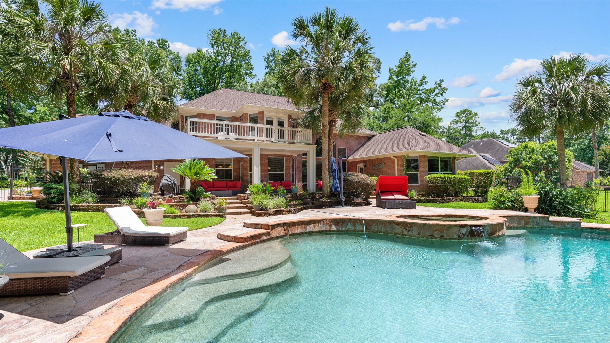 37703 Edgewater Drive Pinehurst, TX 77362 - Photo 35 of 37 a view of swimming pool with outdoor seating and plants