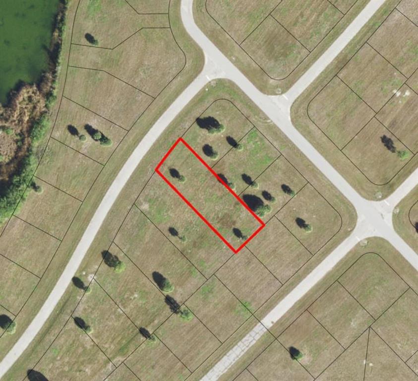 11968 Ronda Drive Placida, FL 33946 - Photo 2 of 2 a bedroom with a bed