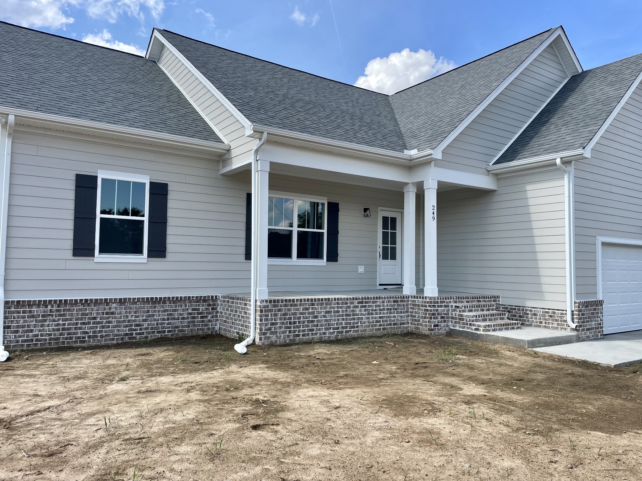 249 Tom Ferrell Road Portland, TN 37148 - Photo 2 of 28 a view of a house with a yard