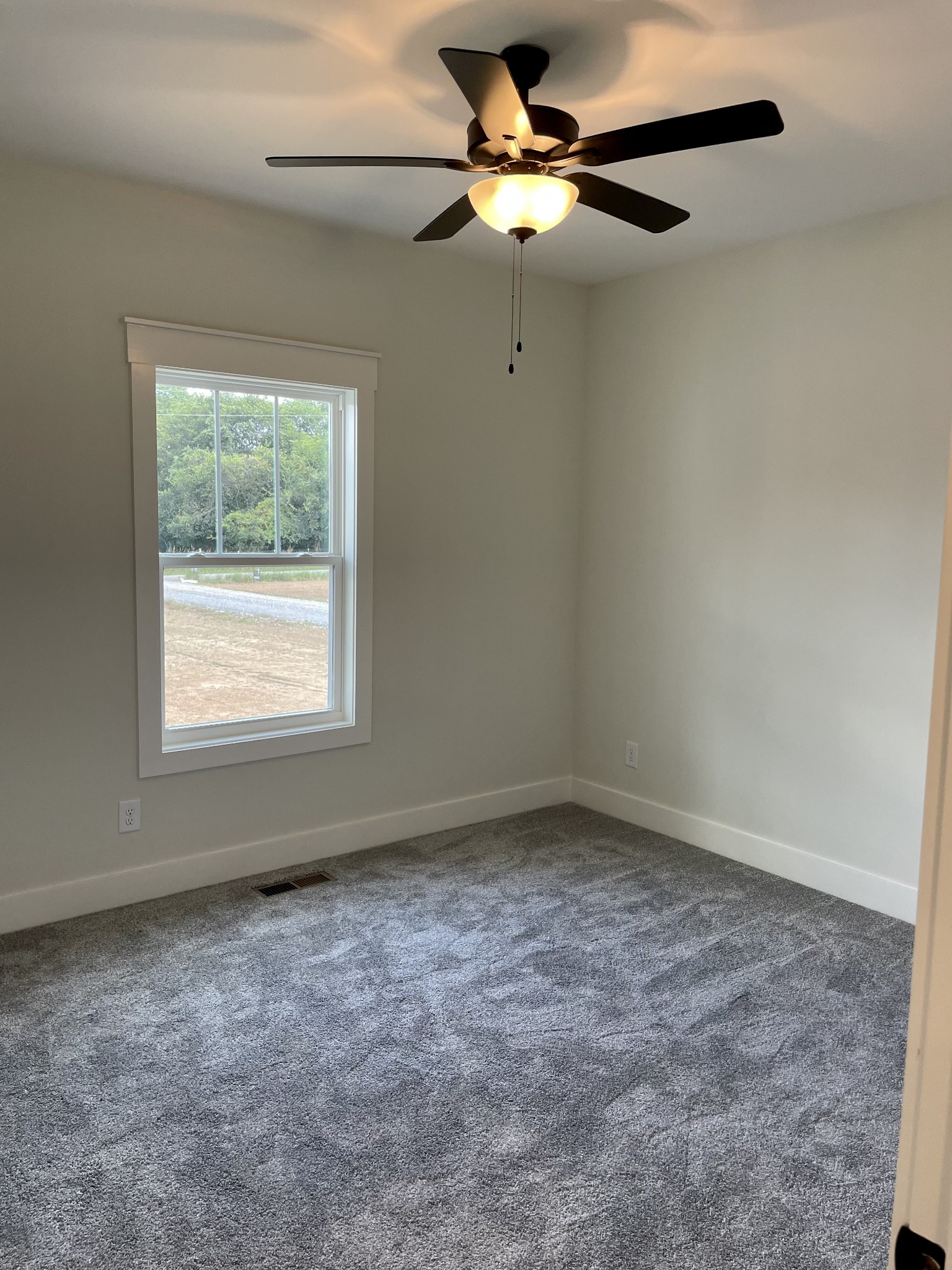 249 Tom Ferrell Road Portland, TN 37148 - Photo 24 of 28 an empty room with a window