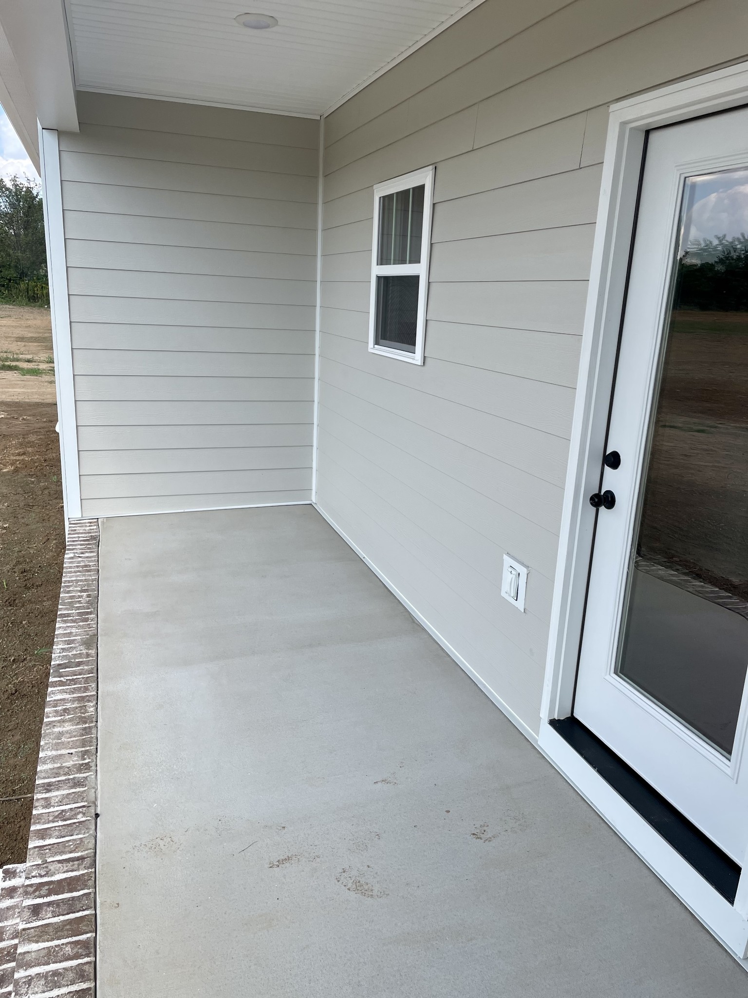 249 Tom Ferrell Road Portland, TN 37148 - Photo 8 of 28 a view of a house with a hallway