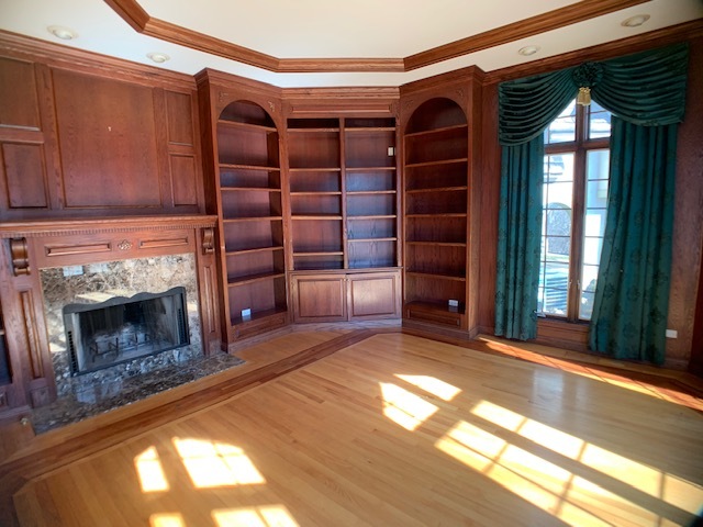220 Bradwell Road Inverness, IL 60010 - Photo 4 of 20 a view of a livingroom with furniture and a fireplace