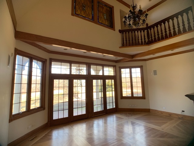 220 Bradwell Road Inverness, IL 60010 - Photo 10 of 20 a view of an empty room window and wooden floor