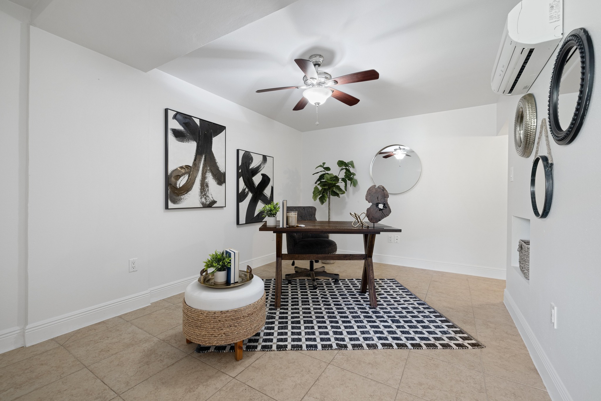 13566 Bullick Hollow Road Austin, TX 78726 - Photo 27 of 32 a living room with furniture and a chandelier