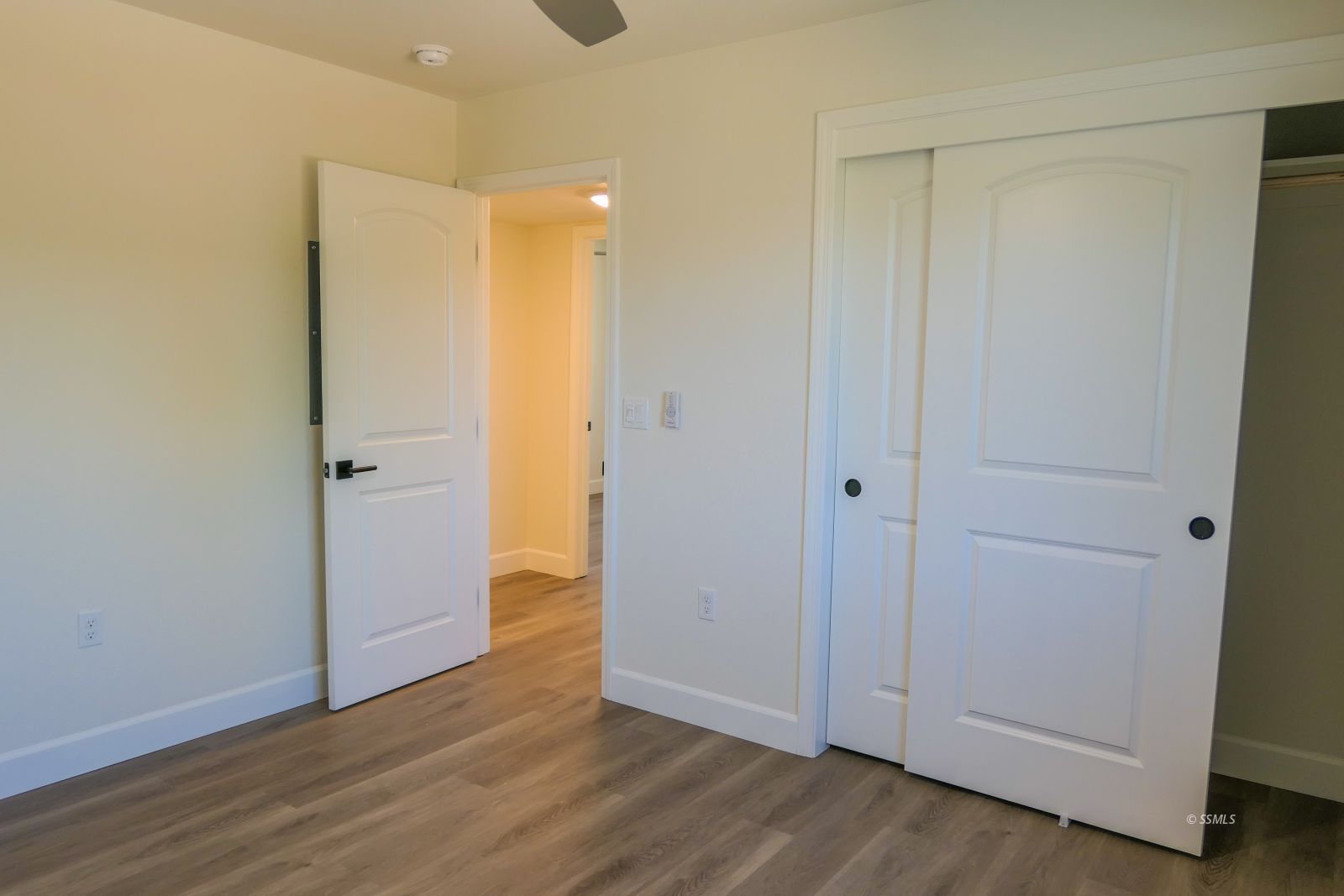 736 West Howell Avenue Ridgecrest, CA 93555 - Photo 36 of 50 a view of an empty room with wooden floor and closet