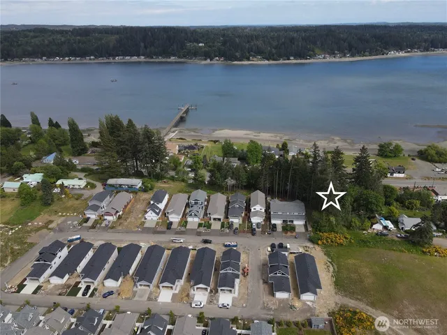 a view of a lake with furniture