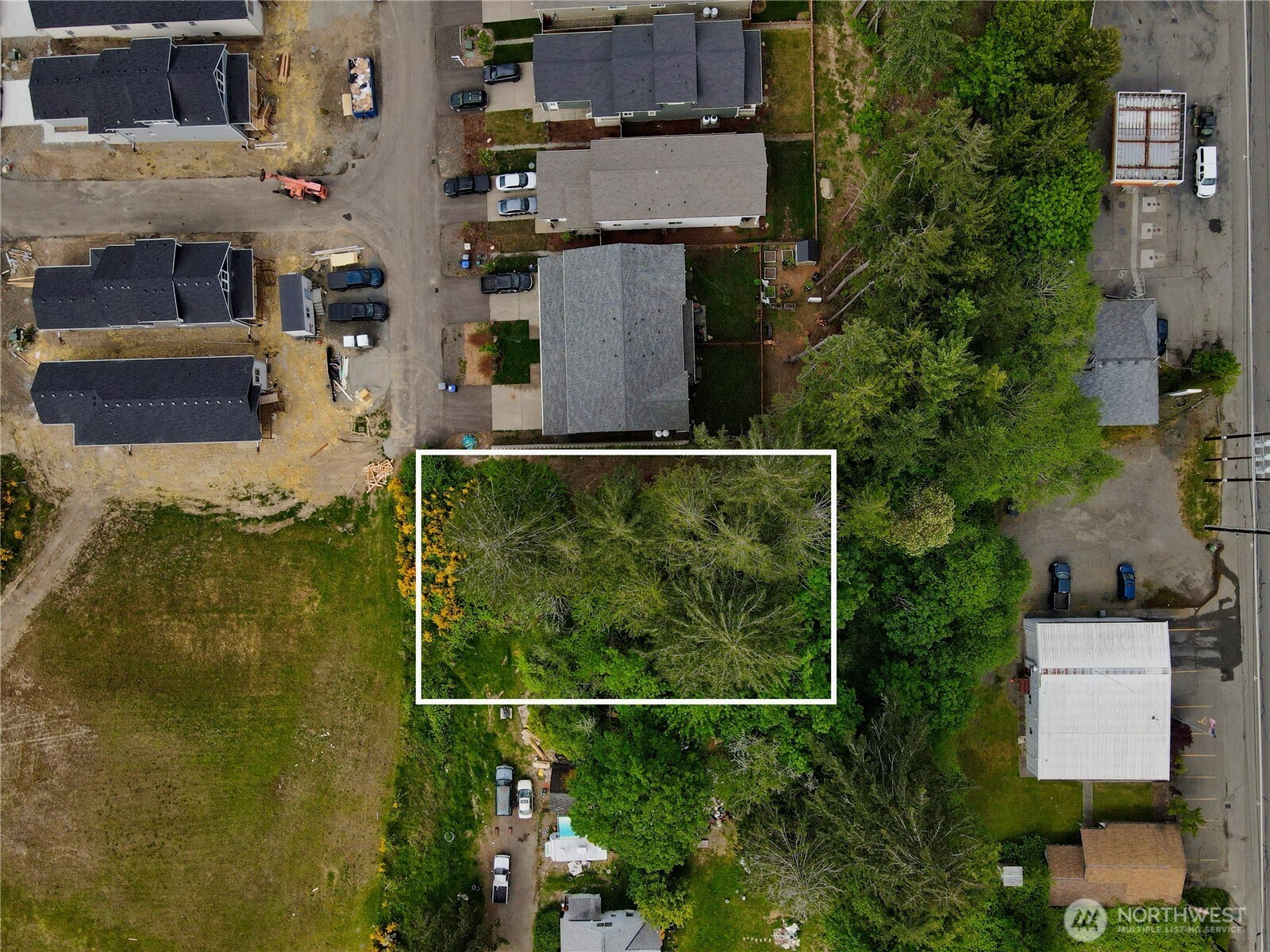 0 Sullivan Road Allyn, WA 98524 - Photo 2 of 7 an aerial view of residential houses with outdoor space and street view