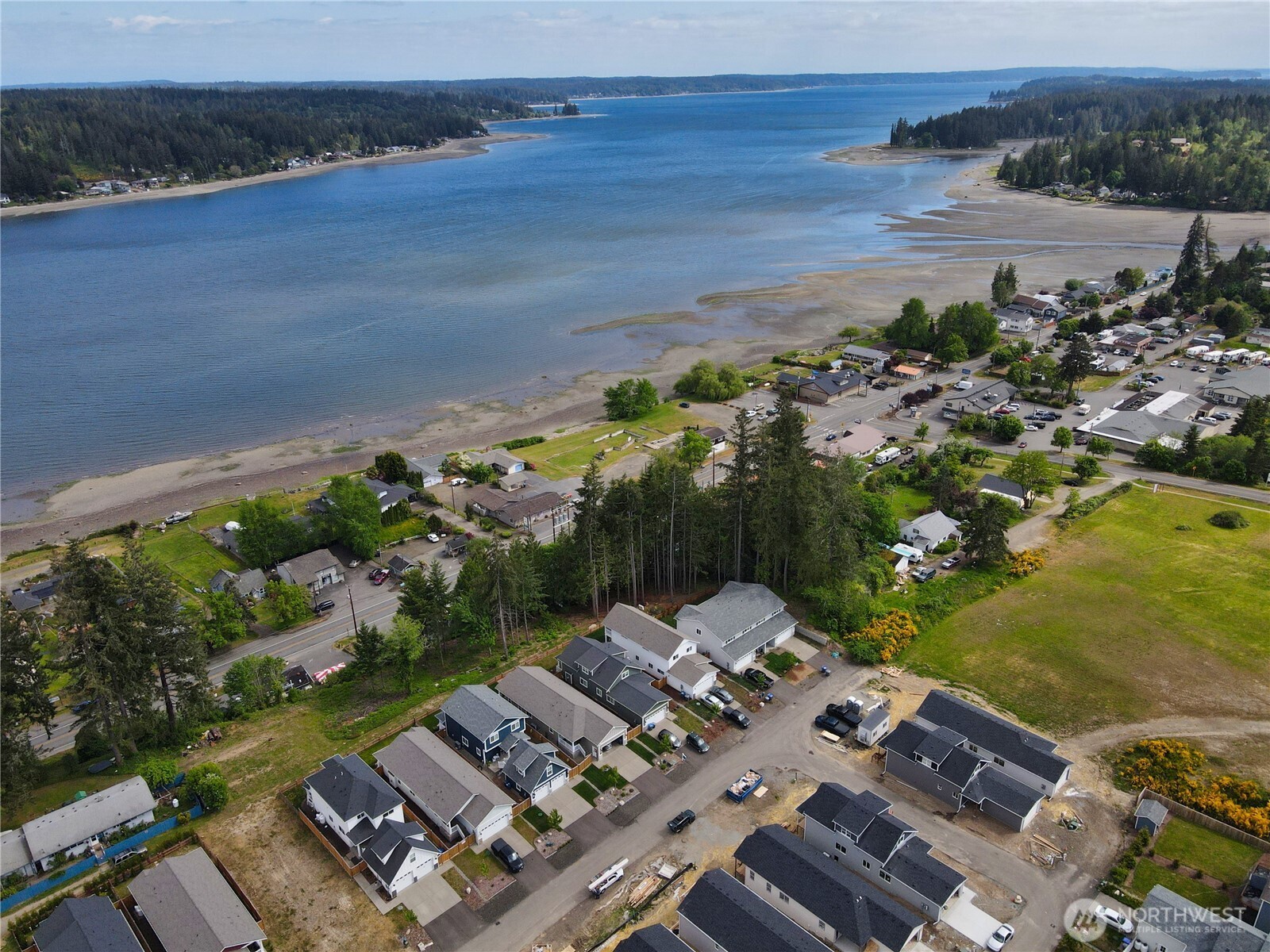 0 Sullivan Road Allyn, WA 98524 - Photo 3 of 7 a view of a lake with a mountain