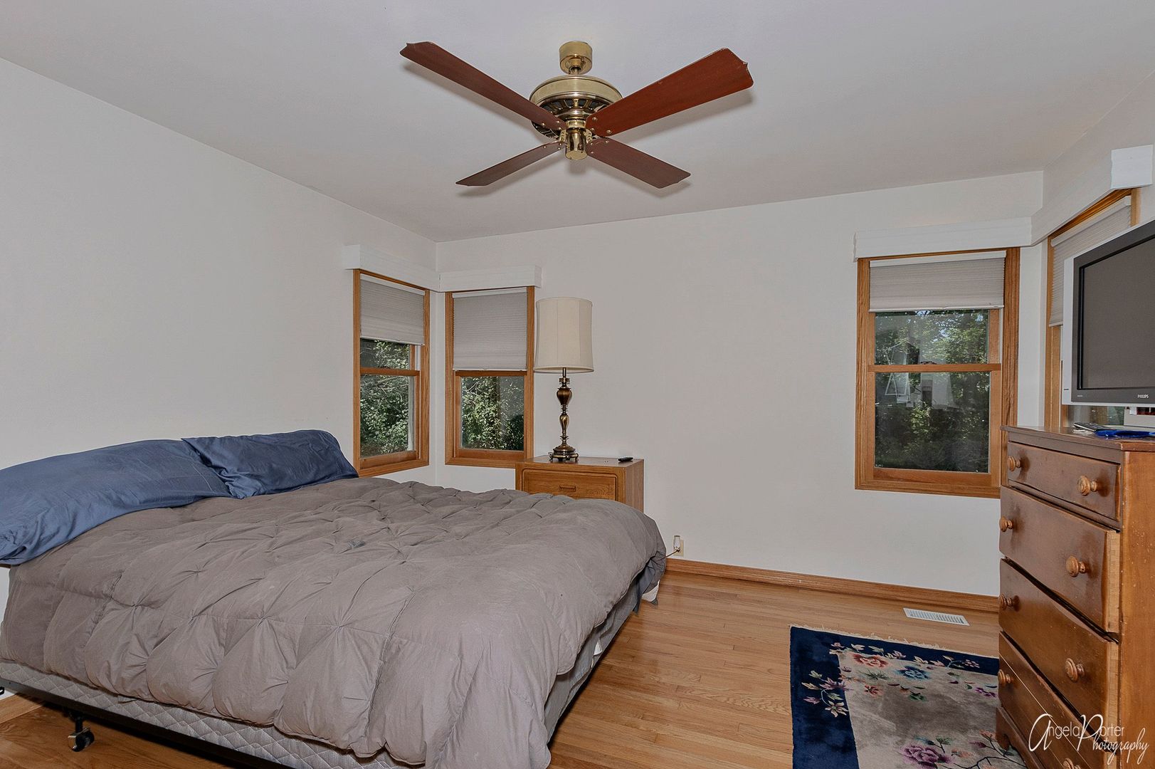 35273 North Wilson Road Ingleside, IL 60041 - Photo 23 of 39 a bedroom with a bed and wooden floor
