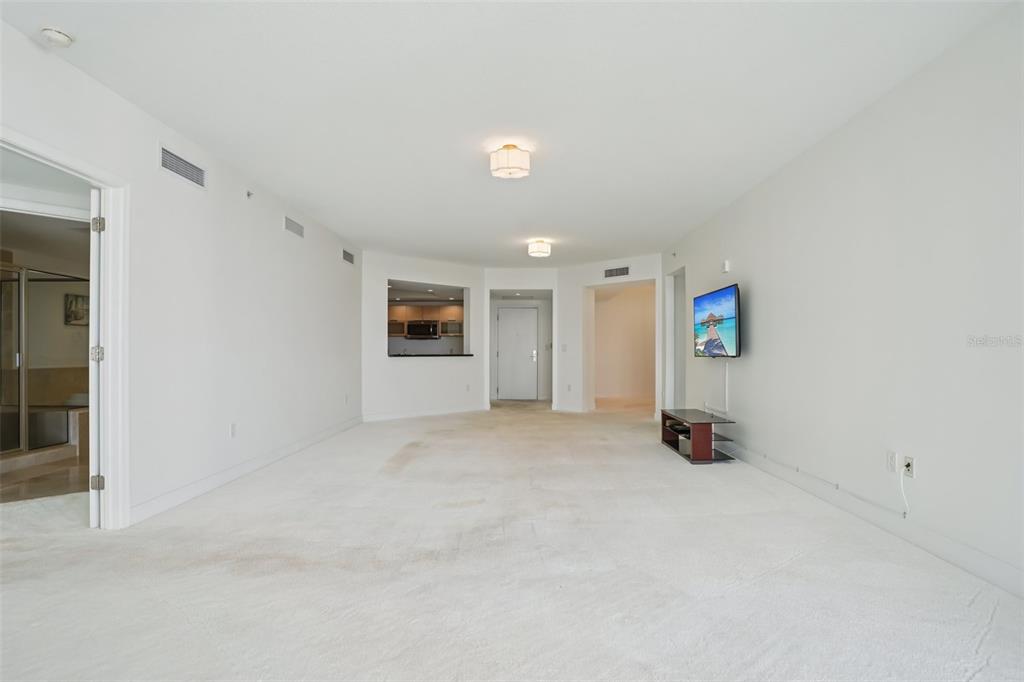 231 Riverside Drive, Unit 8071 Daytona Beach, FL 32117 - Photo 8 of 33 an empty room with windows