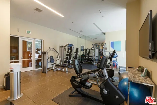 a view of a room with gym equipment