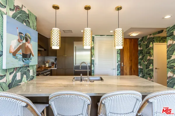 a view of a dining room and chandelier
