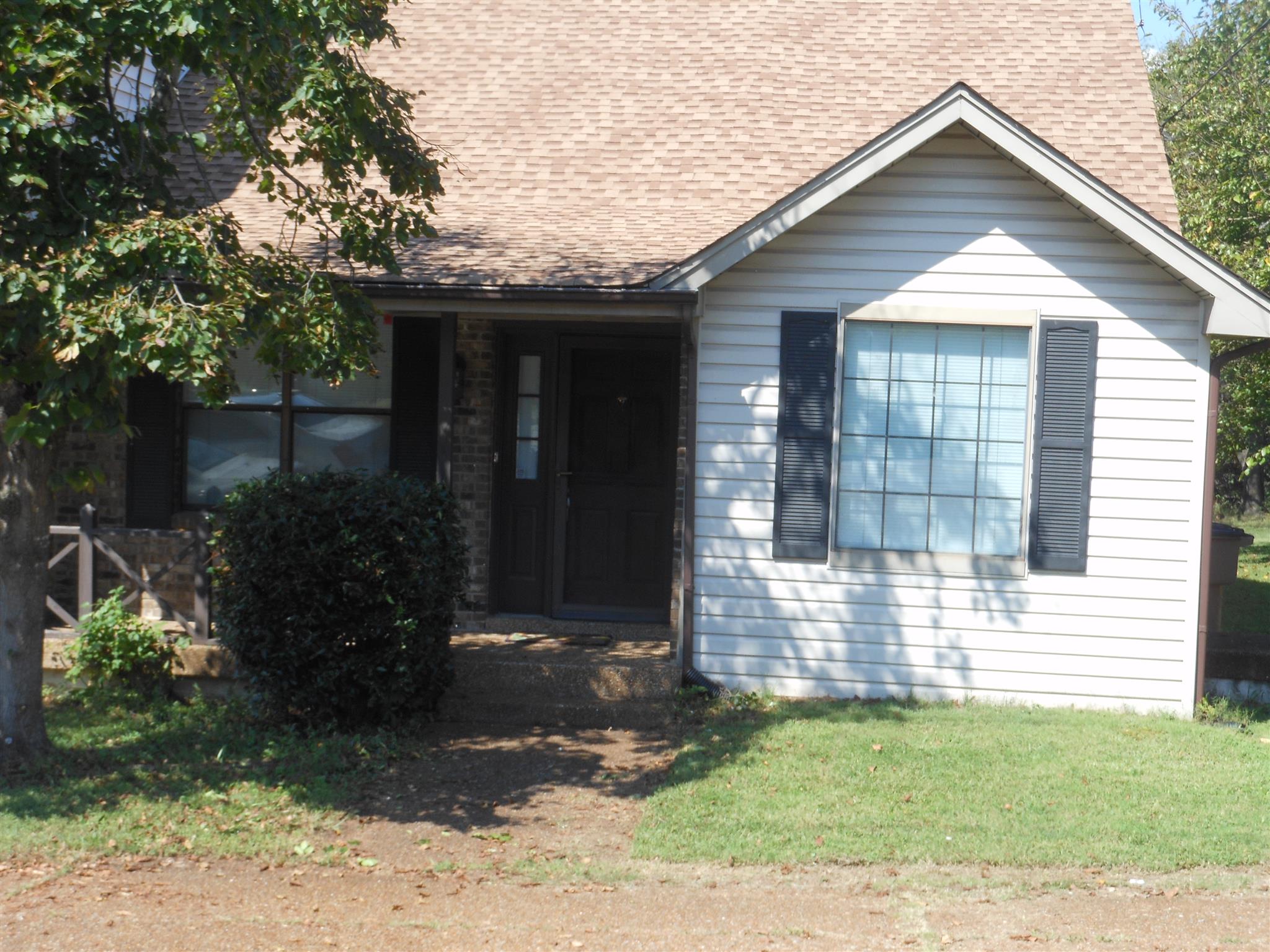 3244 B Anderson Road Antioch, TN 37013 - Photo 1 of 9 a front view of a house with garden