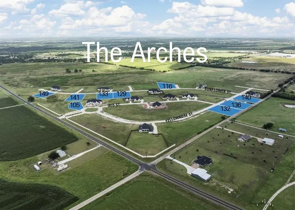 a view of a pool with lawn chairs