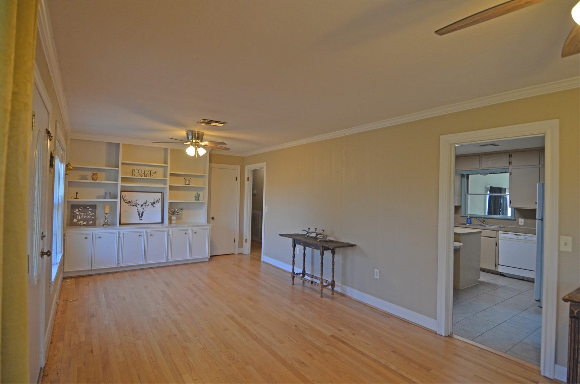2352 Airport Road Brenham, TX 77833 - Photo 9 of 24 a view of a room with furniture and wooden floor